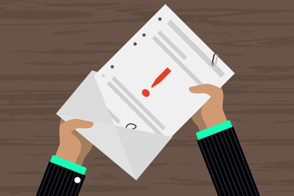 Image of a person opening a notification letter